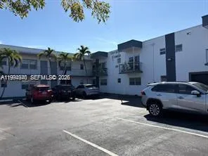 a car parked in front of a building