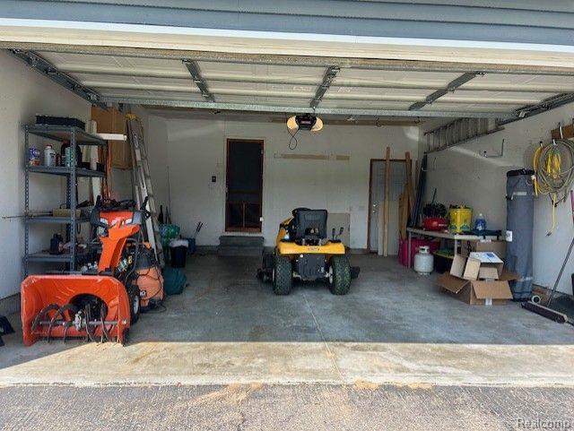 10164 Heather Ridge Court Goodrich, MI 48438 - Photo 9 of 35 Deep two car garage w/ garage door opener