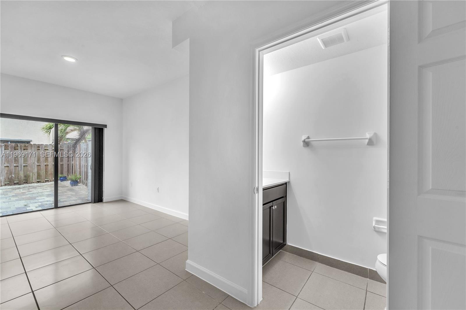 11563 Southwest 248th Lane Homestead, FL 33032 - Photo 13 of 28 a view of entryway with an empty room