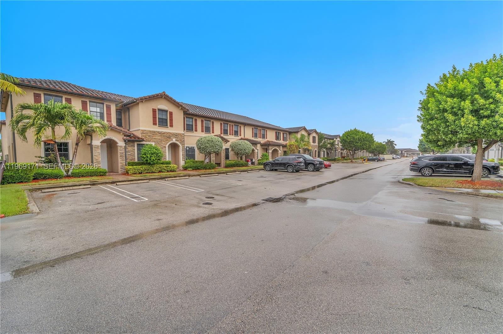 11563 Southwest 248th Lane Homestead, FL 33032 - Photo 28 of 28 a front view of a house with a garden