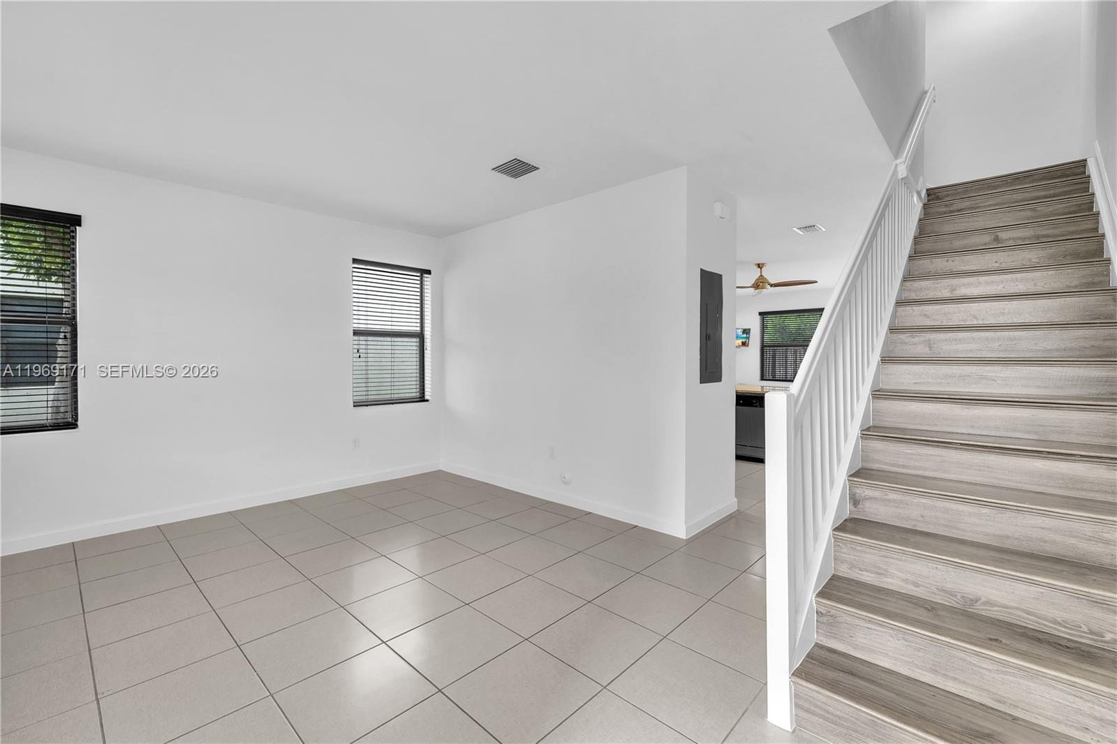 11563 Southwest 248th Lane Homestead, FL 33032 - Photo 5 of 28 a view of an entryway with stairs