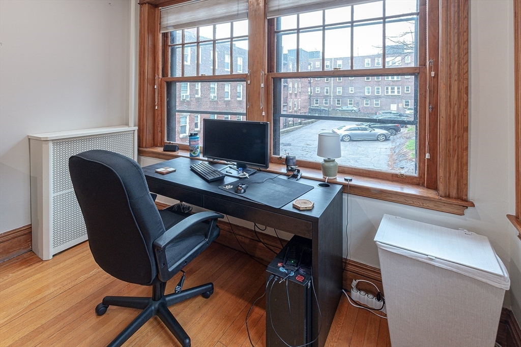50 St Paul Street, Unit 4 Brookline, MA 02446 - Photo 12 of 21 a view of a workspace with furniture and a window