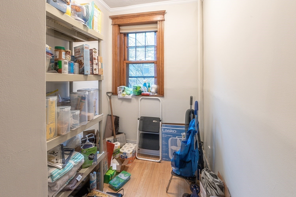50 St Paul Street, Unit 4 Brookline, MA 02446 - Photo 13 of 21 a view of a workspace with furniture and a window