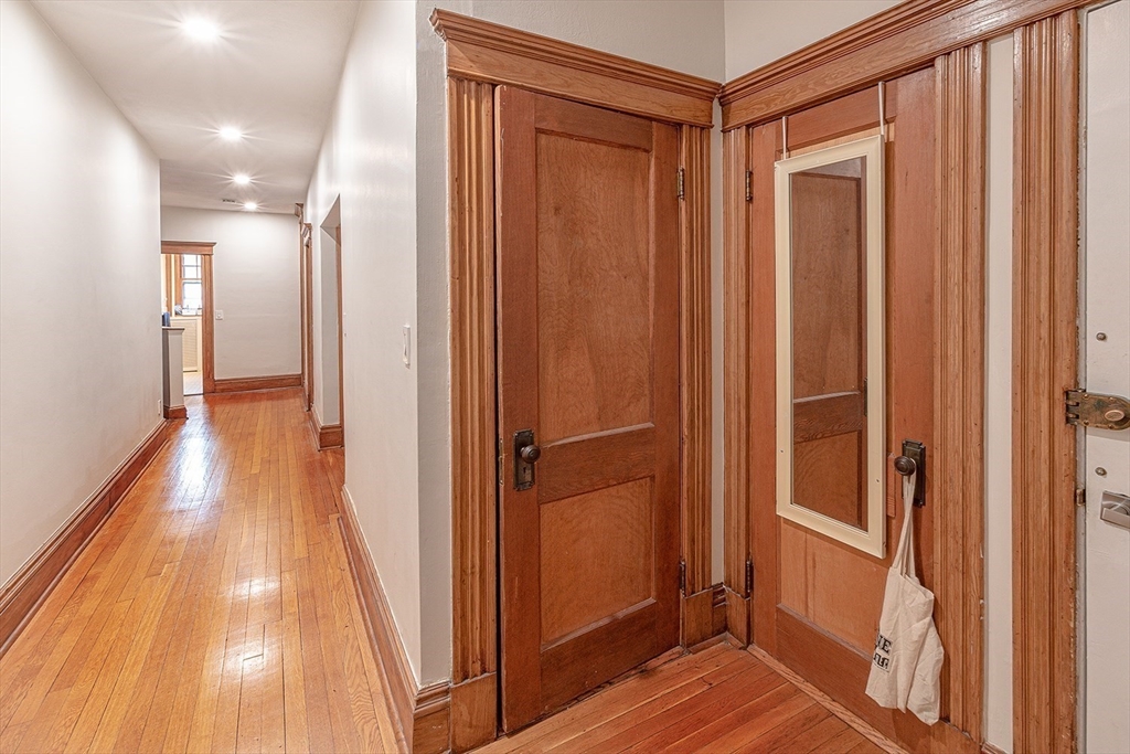 50 St Paul Street, Unit 4 Brookline, MA 02446 - Photo 16 of 21 a view of gallery with wooden floor