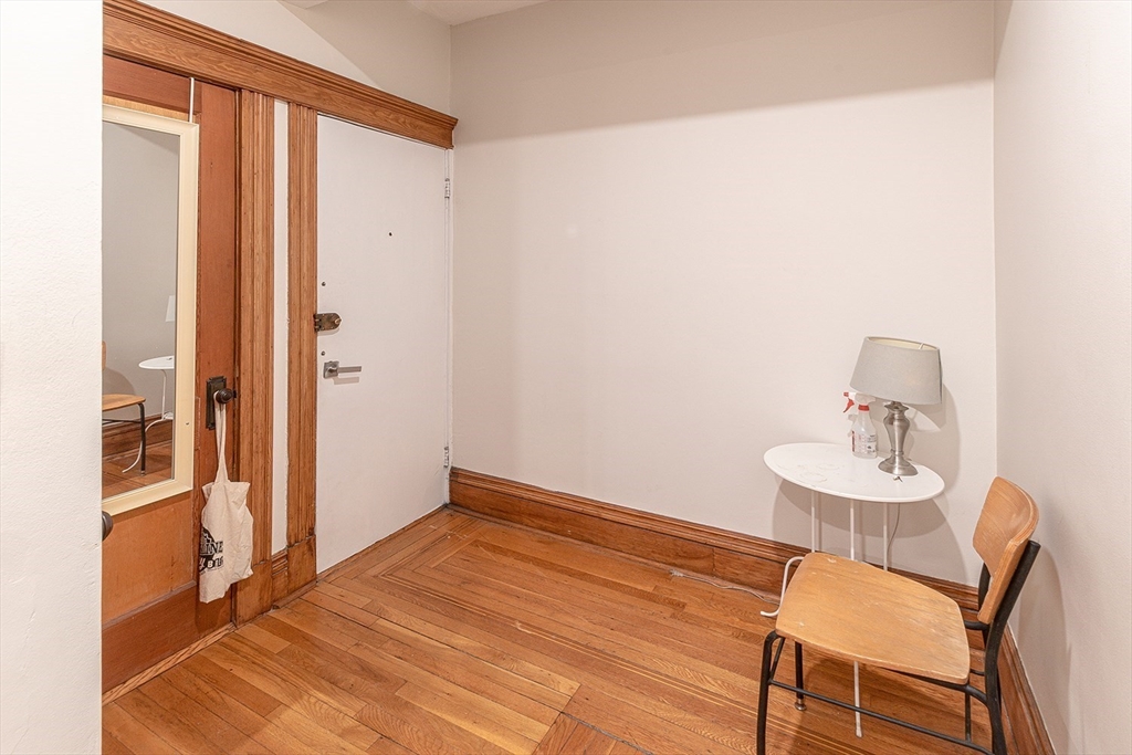 50 St Paul Street, Unit 4 Brookline, MA 02446 - Photo 17 of 21 a view of a dining room with furniture and a window