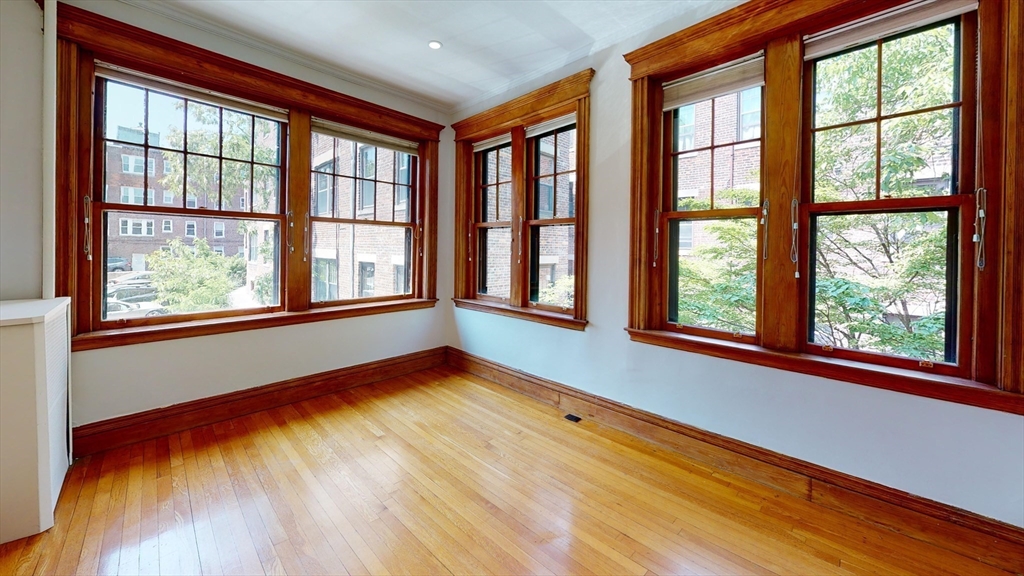 50 St Paul Street, Unit 4 Brookline, MA 02446 - Photo 10 of 21 a view of an empty room with a window