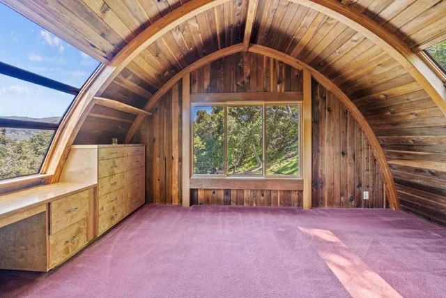 a bathroom with a sink mirror vanity and toilet