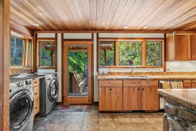 a open kitchen with cabinets