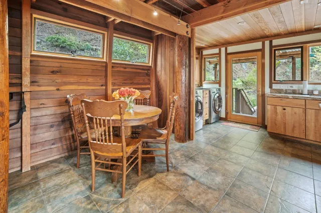 a view of an chairs and tables in the balcony