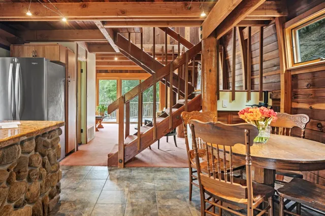 a living room with furniture and a bathtub