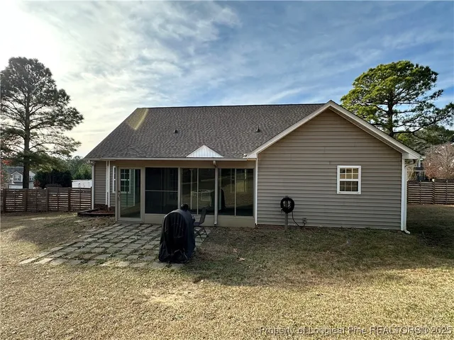 a house view with a garden space