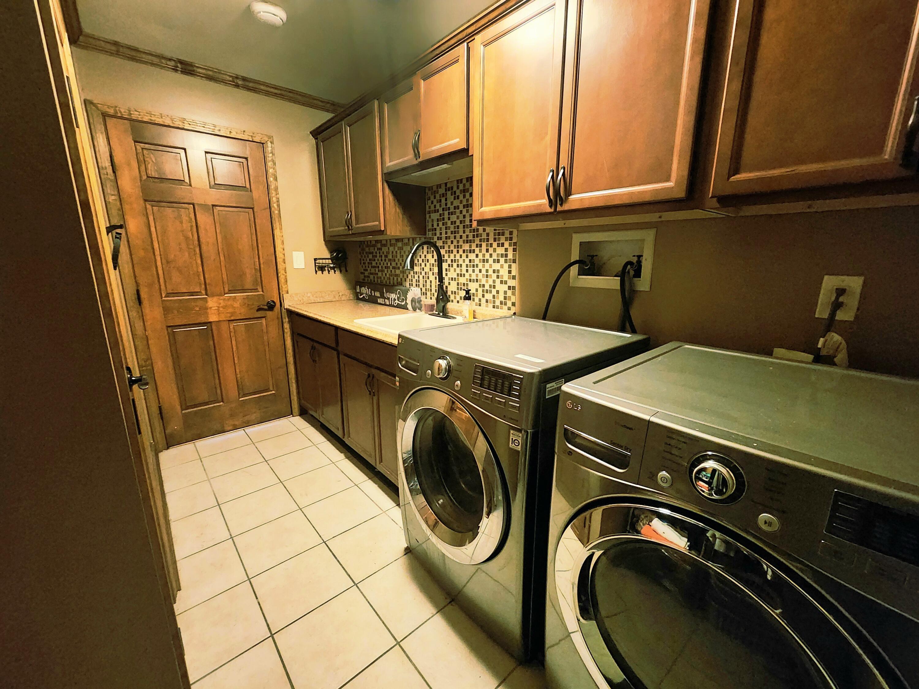 1407 Tyler Court Crown Point, IN 46307 - Photo 14 of 24 a utility room with dryer and washer