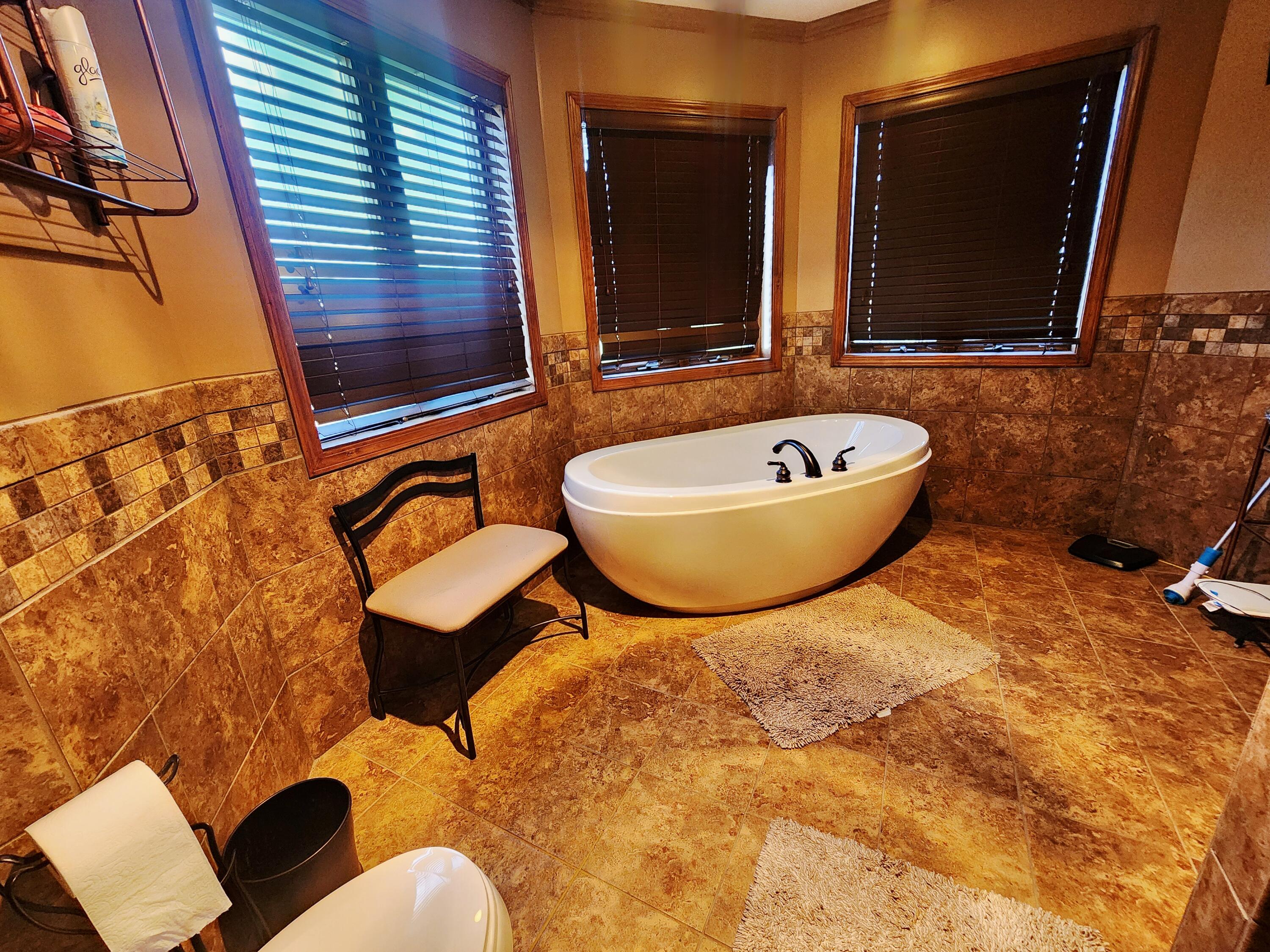 1407 Tyler Court Crown Point, IN 46307 - Photo 17 of 24 a bathroom with a sink and a mirror