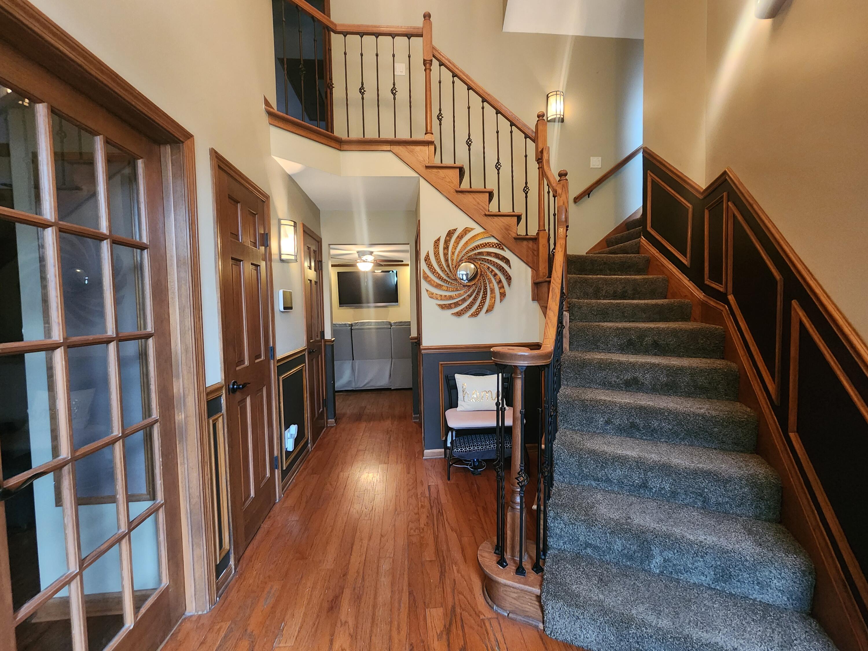 1407 Tyler Court Crown Point, IN 46307 - Photo 3 of 24 a view of entryway and hall with wooden floor