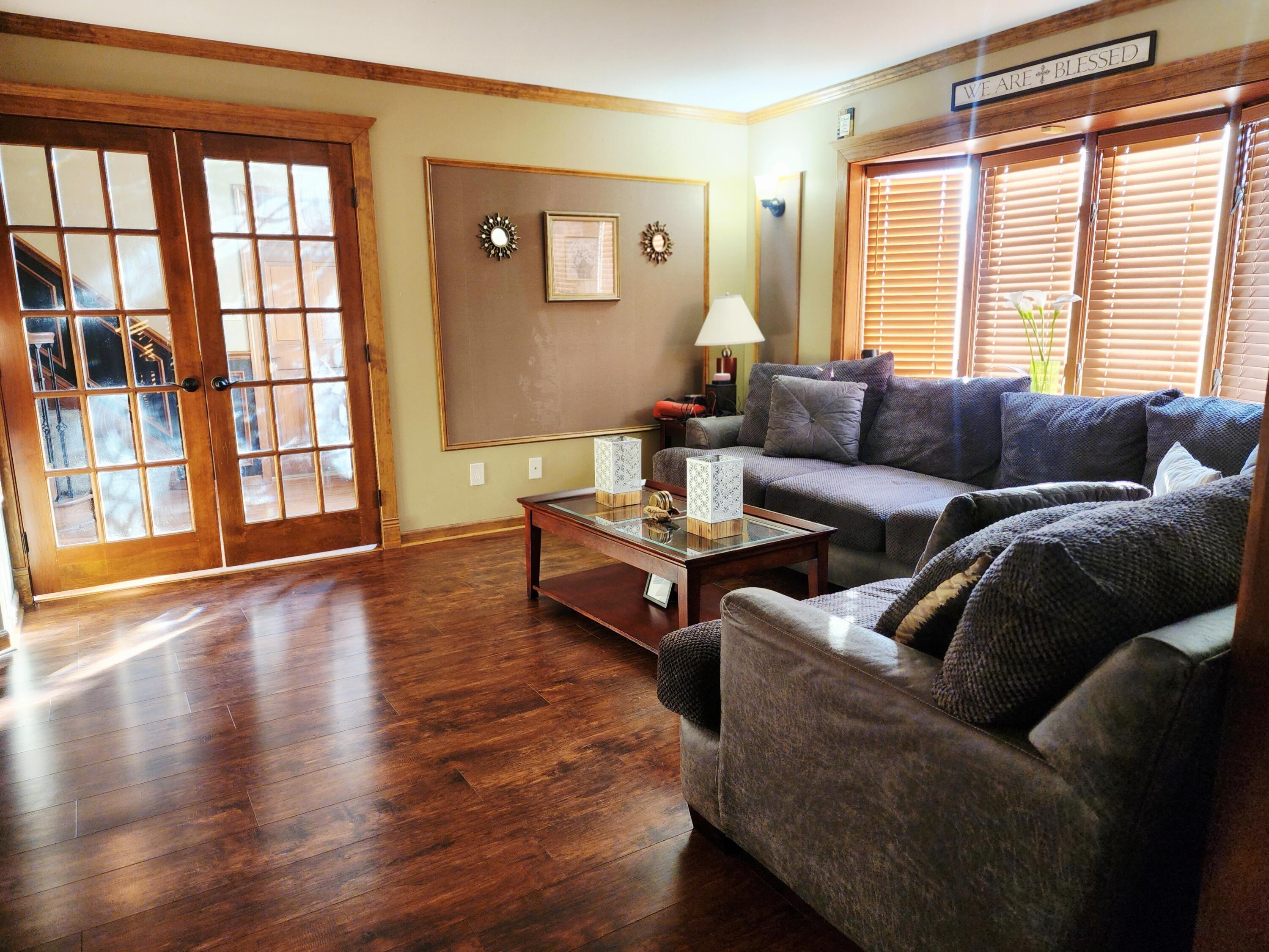 1407 Tyler Court Crown Point, IN 46307 - Photo 5 of 24 a living room with furniture and a large window