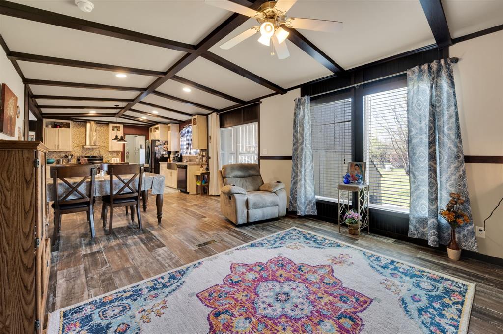 12032 County Road 0190 Rice, TX 75155 - Photo 23 of 40 a living room with furniture and a wooden floor