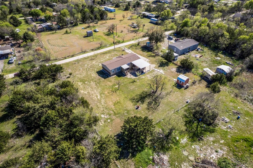 12032 County Road 0190 Rice, TX 75155 - Photo 32 of 40 an aerial view of residential houses with outdoor space