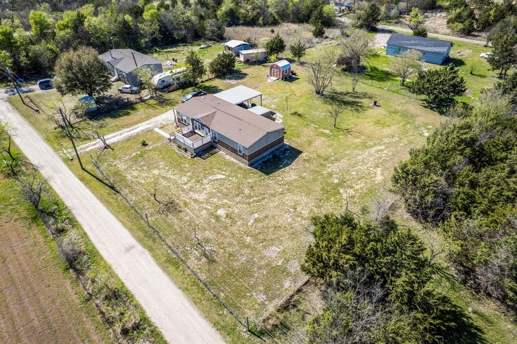 12032 County Road 0190 Rice, TX 75155 - Photo 39 of 40 a aerial view of a house with a garden and lake view