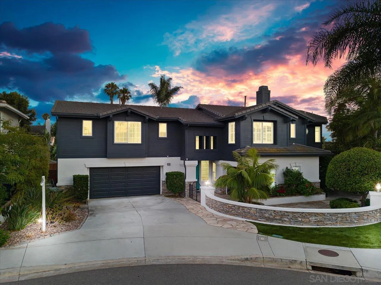 219 Jacob Lane Encinitas, CA 92024 - Photo 1 of 46 a front view of a house with a yard