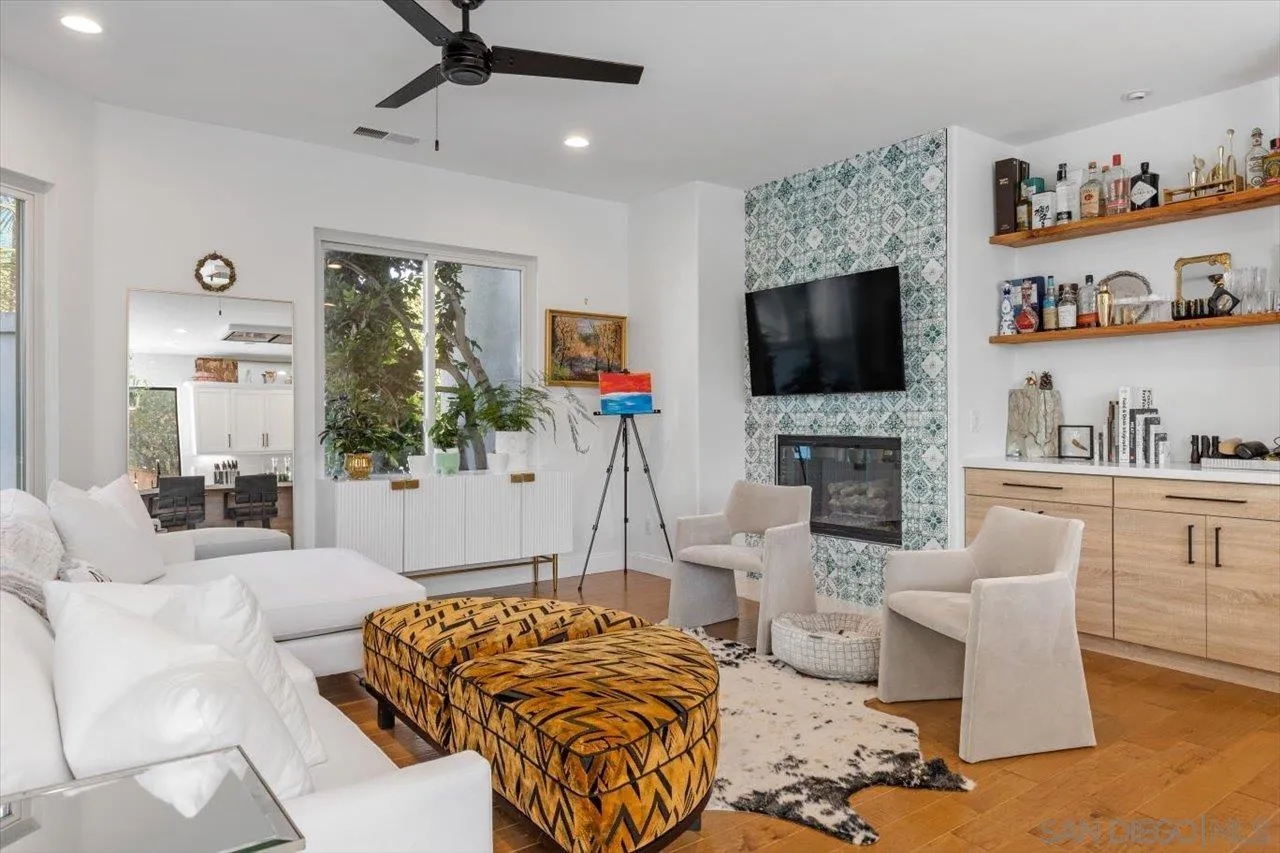 219 Jacob Lane Encinitas, CA 92024 - Photo 11 of 46 a living room with furniture and a flat screen tv