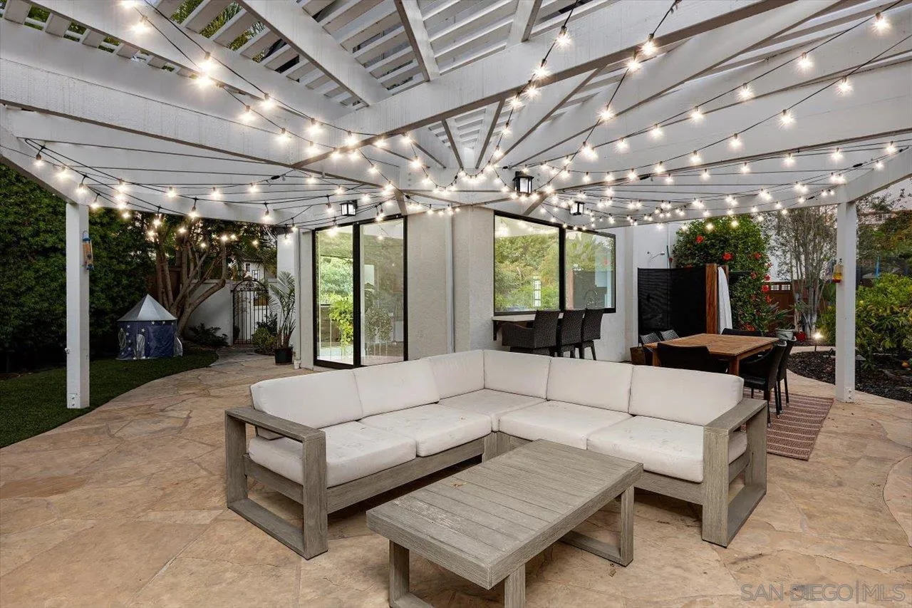 219 Jacob Lane Encinitas, CA 92024 - Photo 3 of 46 a living room with furniture and a large window