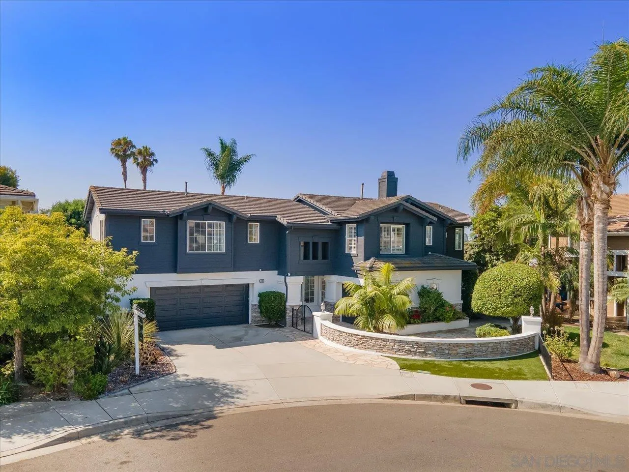 219 Jacob Lane Encinitas, CA 92024 - Photo 41 of 46 a front view of a house with a yard
