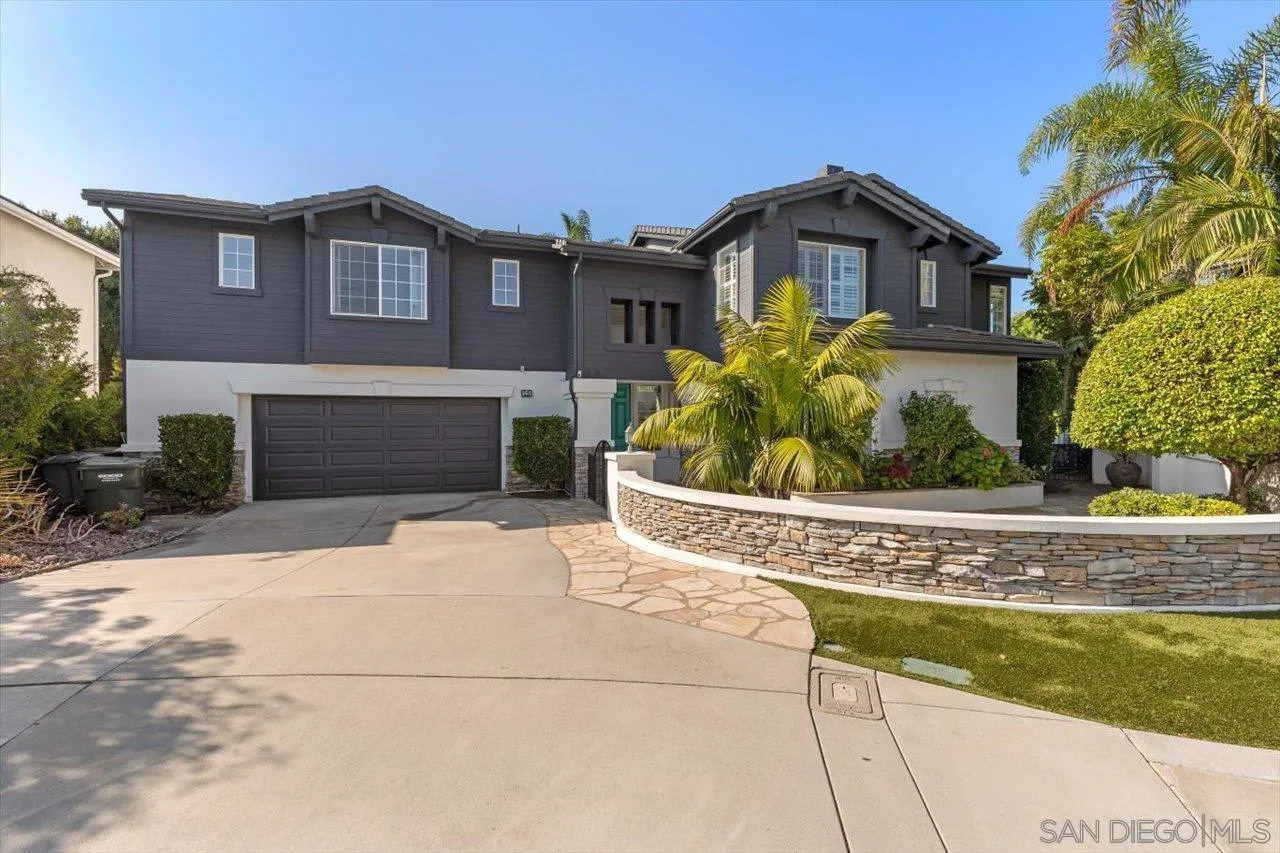 219 Jacob Lane Encinitas, CA 92024 - Photo 42 of 46 a front view of a house with a garden