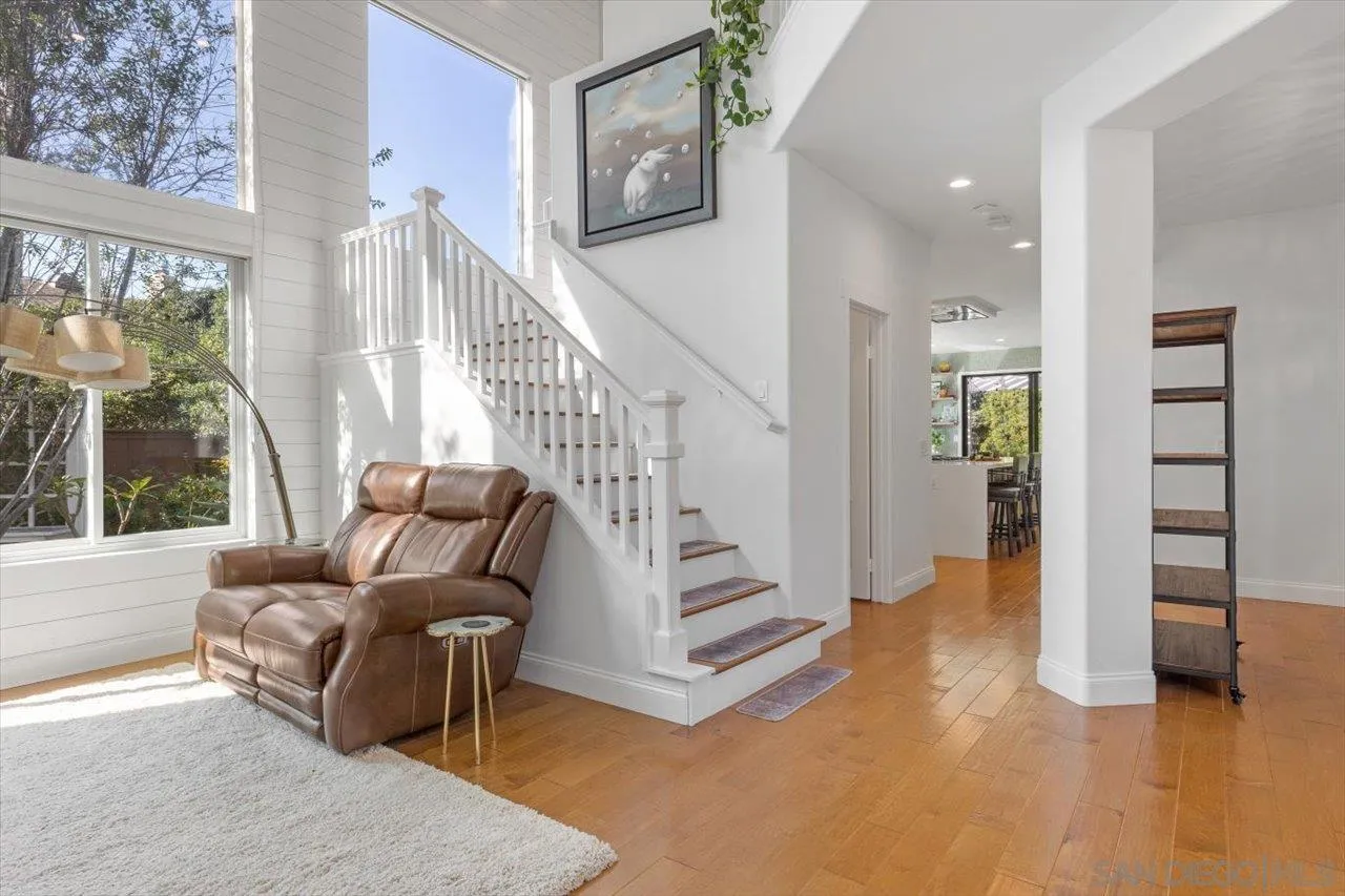 219 Jacob Lane Encinitas, CA 92024 - Photo 6 of 46 a living room with furniture and a wooden floor