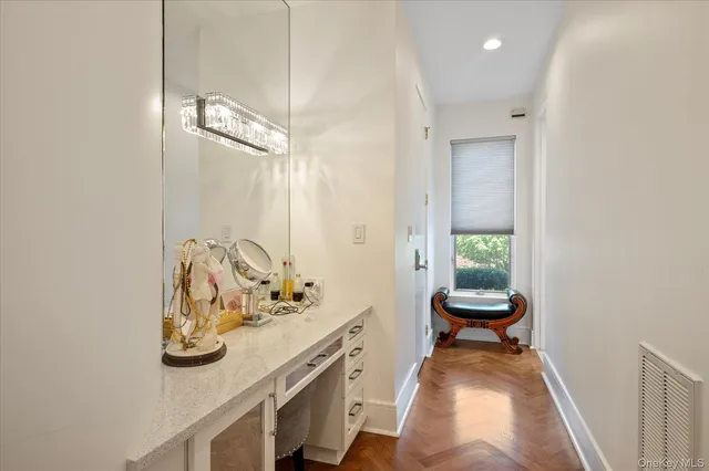 a view of bathroom with dual sinks