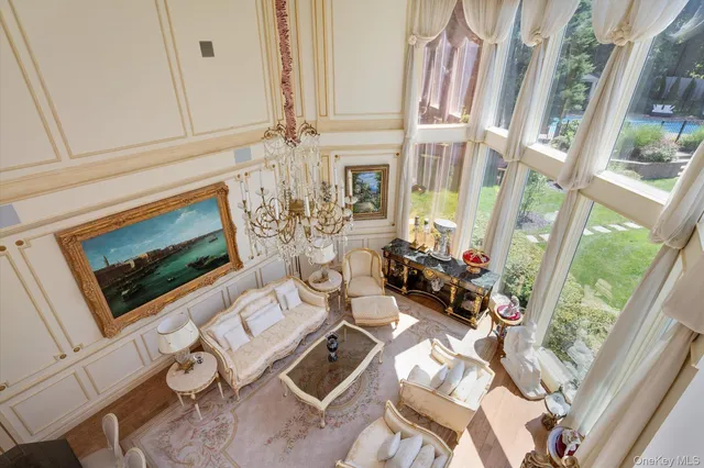 a view of living room with furniture and flat screen tv