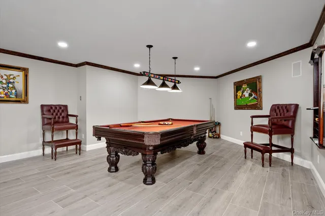 a room with furniture and wooden floor