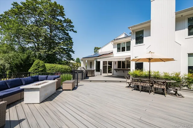 a front view of a house with patio outdoor seating