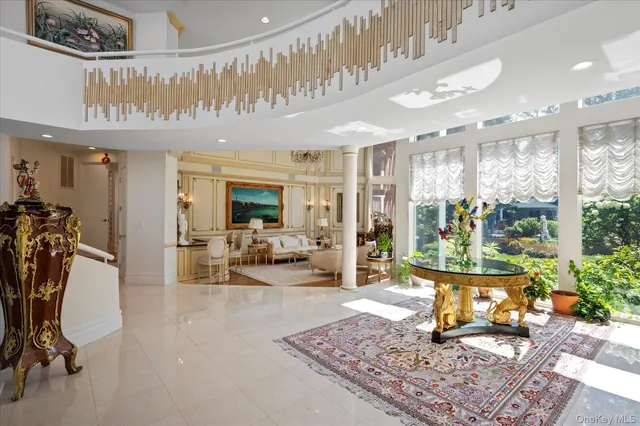 a living room with furniture and a table