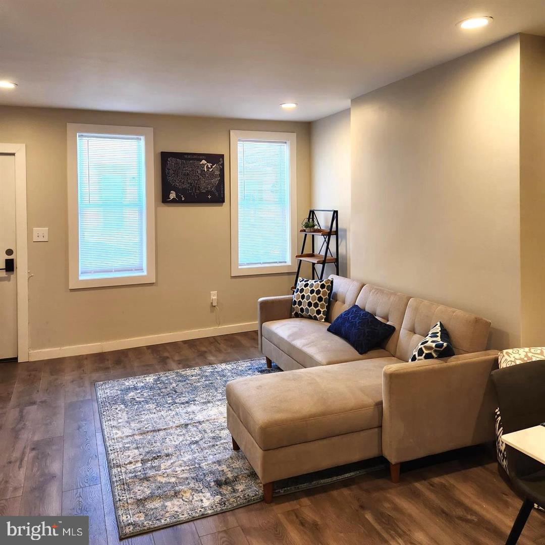 1247 South Newkirk Street Philadelphia, PA 19146 - Photo 3 of 20 a living room with furniture and a window