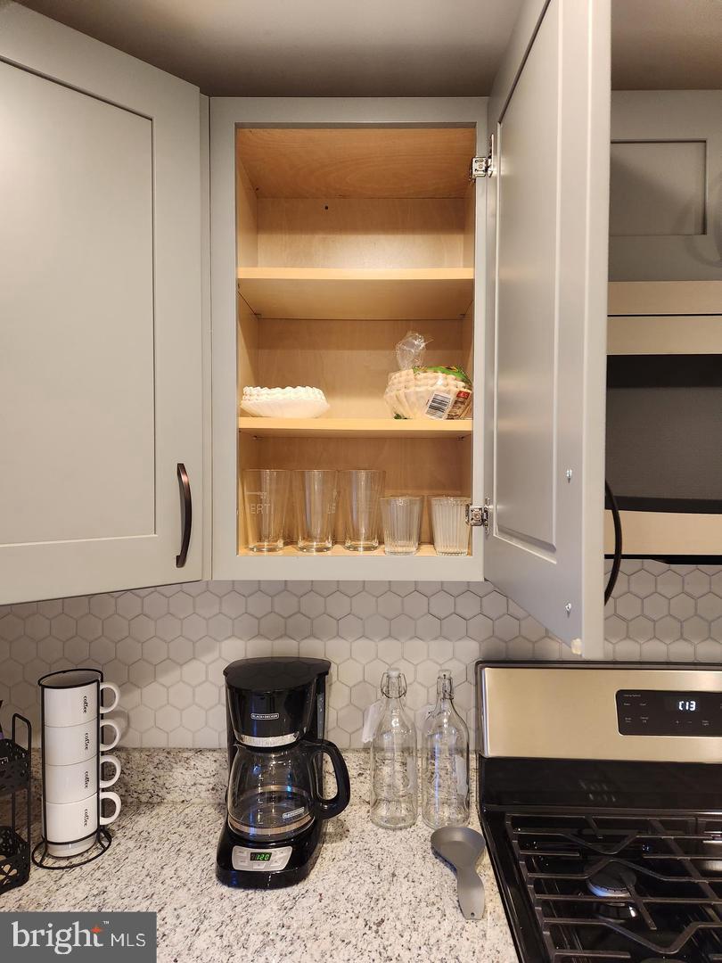 1247 South Newkirk Street Philadelphia, PA 19146 - Photo 7 of 20 a kitchen with a sink and a stove top oven