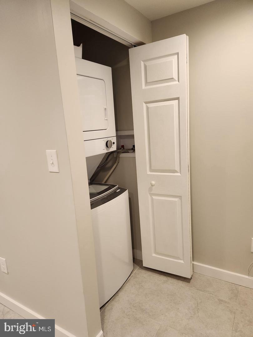 1247 South Newkirk Street Philadelphia, PA 19146 - Photo 9 of 20 a utility room with dryer and washer