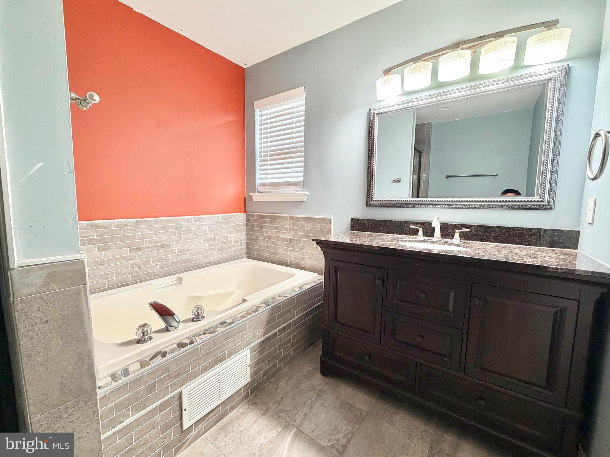 37 Richards Road Lawrenceville, NJ 08648 - Photo 15 of 25 a bathroom with a bathtub sink and mirror