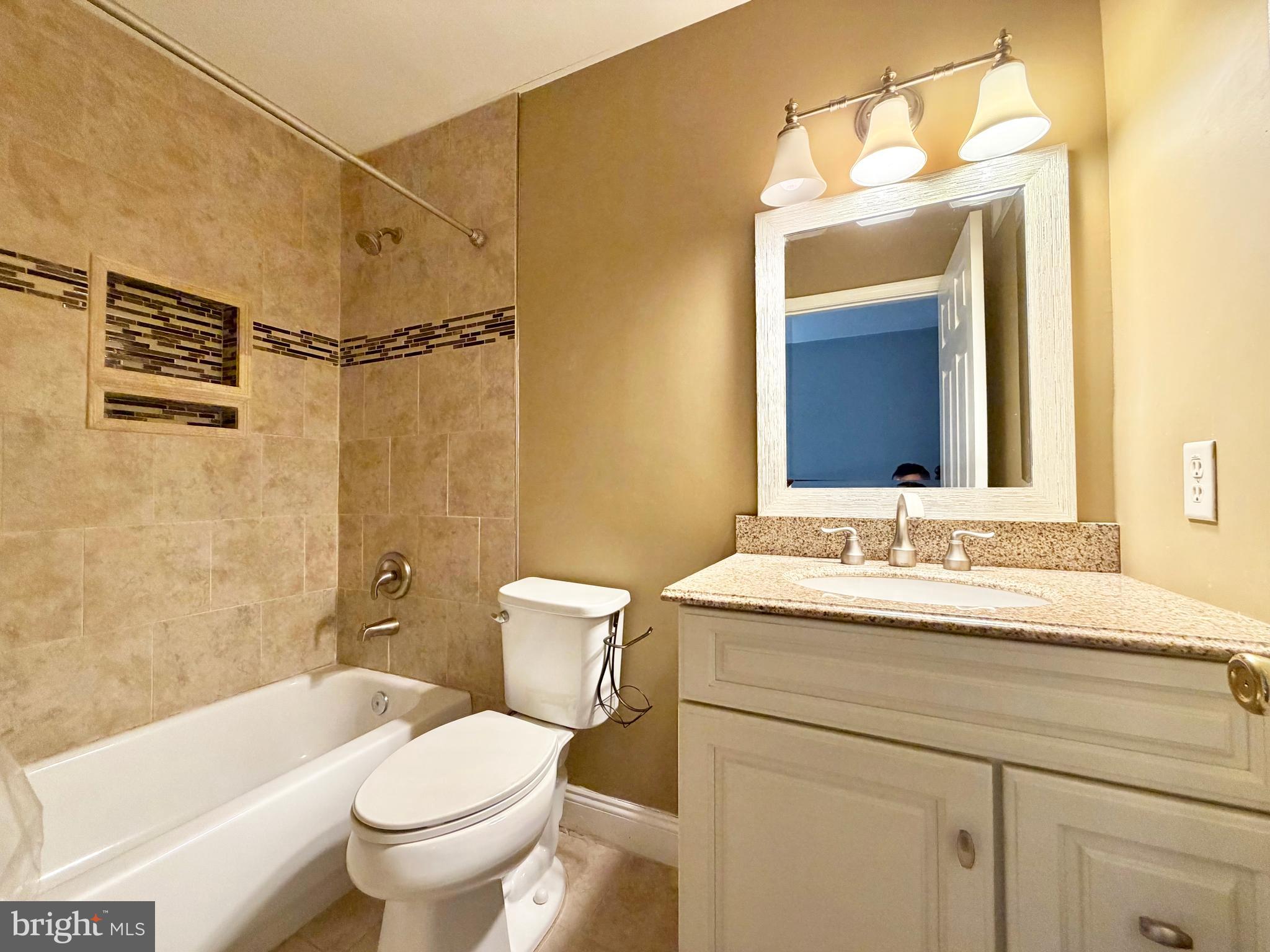 37 Richards Road Lawrenceville, NJ 08648 - Photo 17 of 25 a bathroom with a sink vanity mirror and toilet