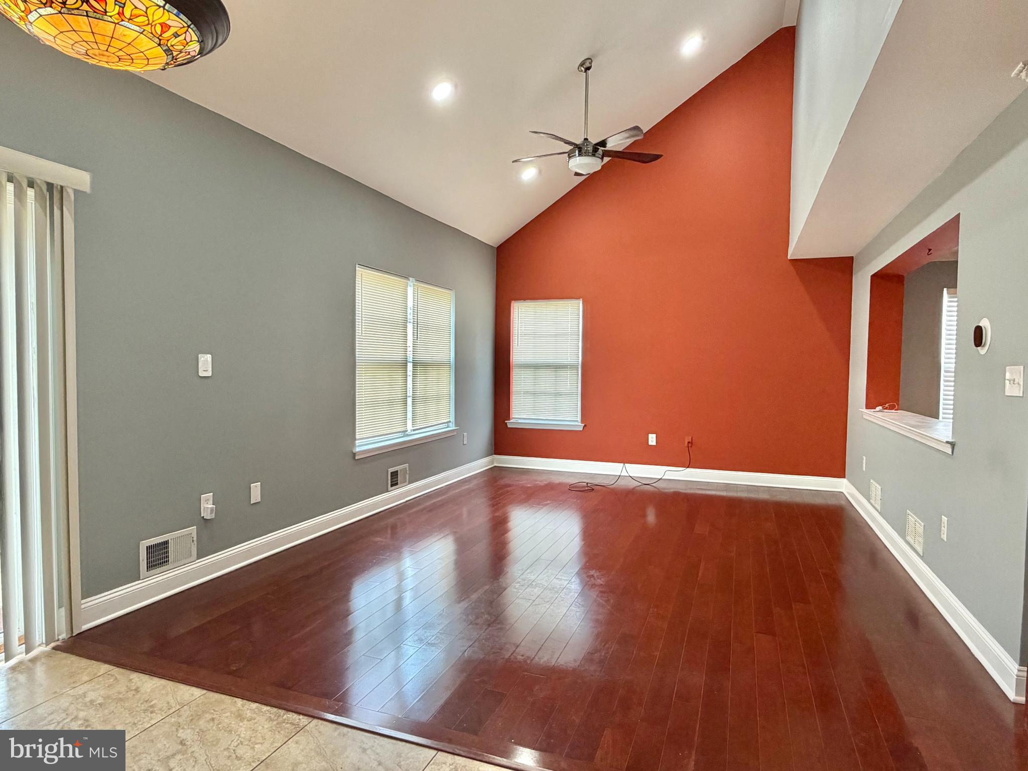 37 Richards Road Lawrenceville, NJ 08648 - Photo 2 of 25 an empty room with wooden floor and windows