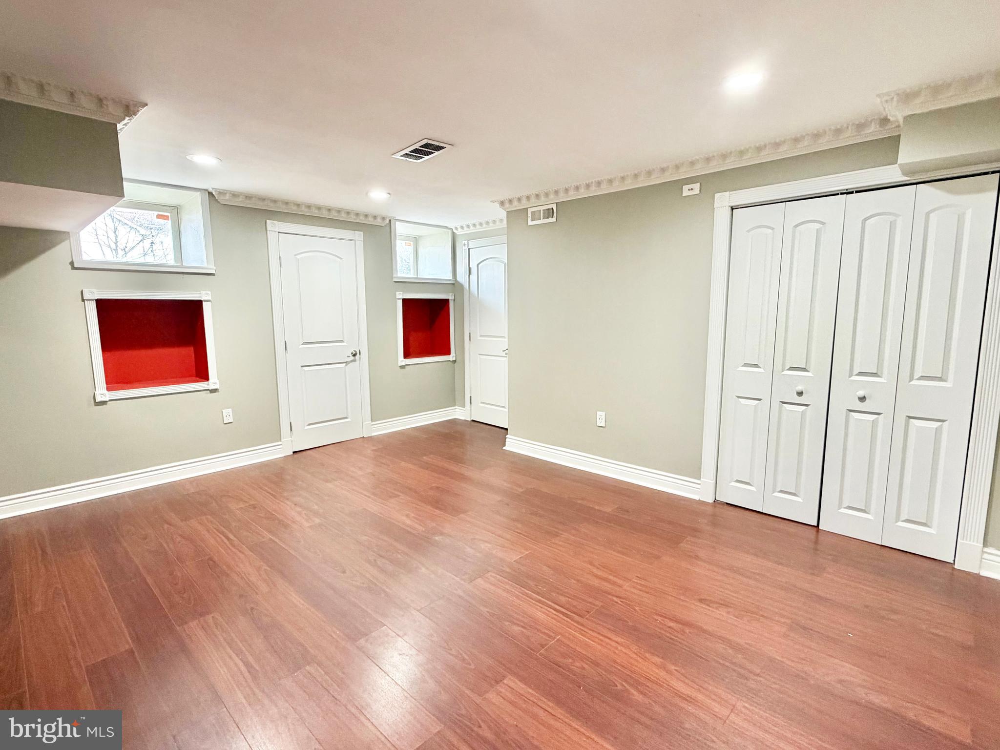 37 Richards Road Lawrenceville, NJ 08648 - Photo 25 of 25 a view of an empty room with wooden floor and a window