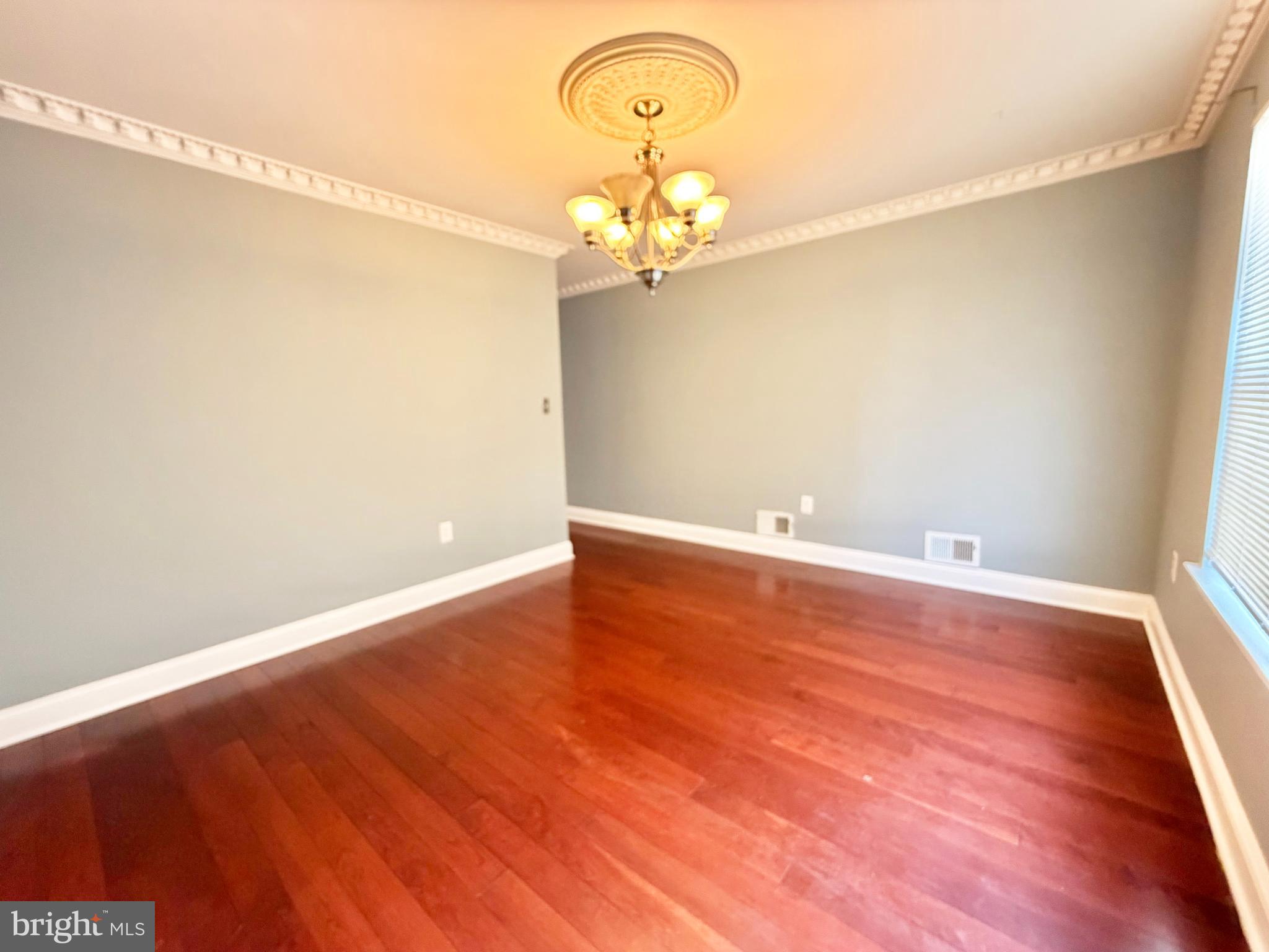 37 Richards Road Lawrenceville, NJ 08648 - Photo 6 of 25 a view of a room with wooden floor and ceiling fan