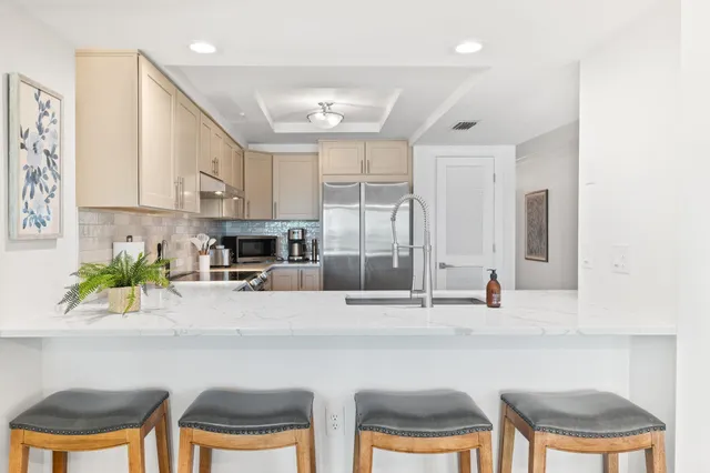 a kitchen with sink and window