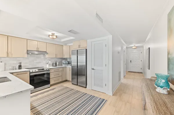 a spacious bedroom with a bed and a couch