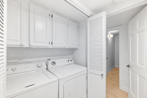 a view of a balcony with furniture