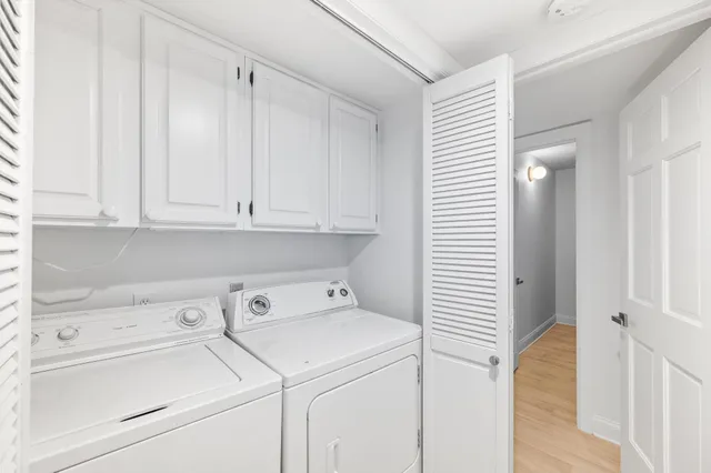 a view of a balcony with furniture