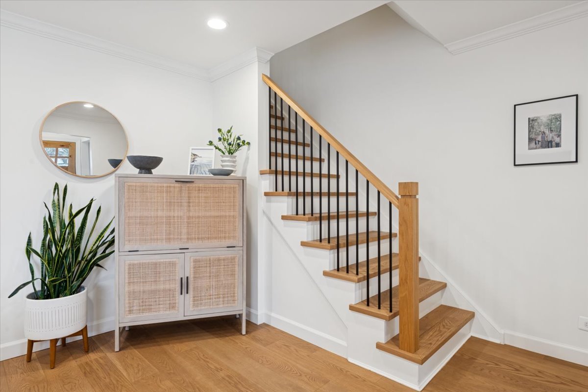 736 Ottawa Avenue Park Ridge, IL 60068 - Photo 13 of 33 a view of staircase with wooden floor and a potted plant