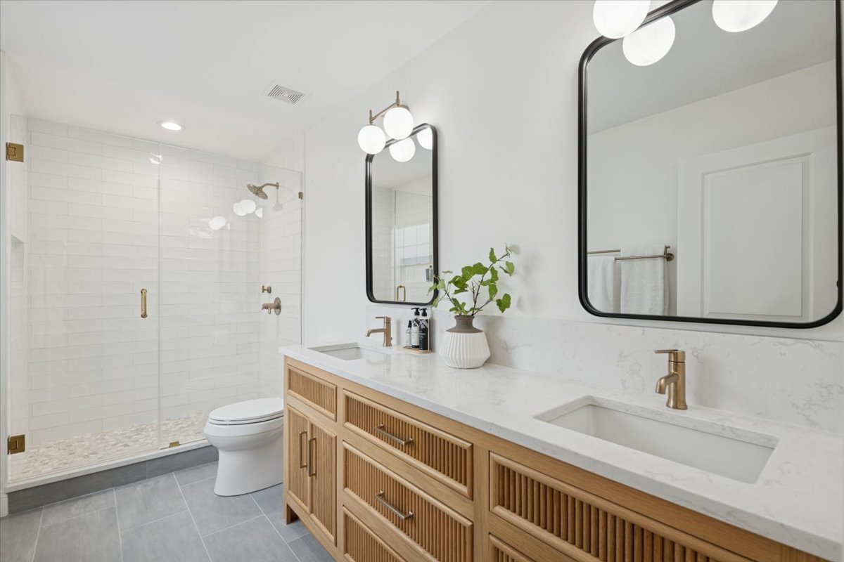 736 Ottawa Avenue Park Ridge, IL 60068 - Photo 18 of 33 a bathroom with a double vanity sink mirror and toilet