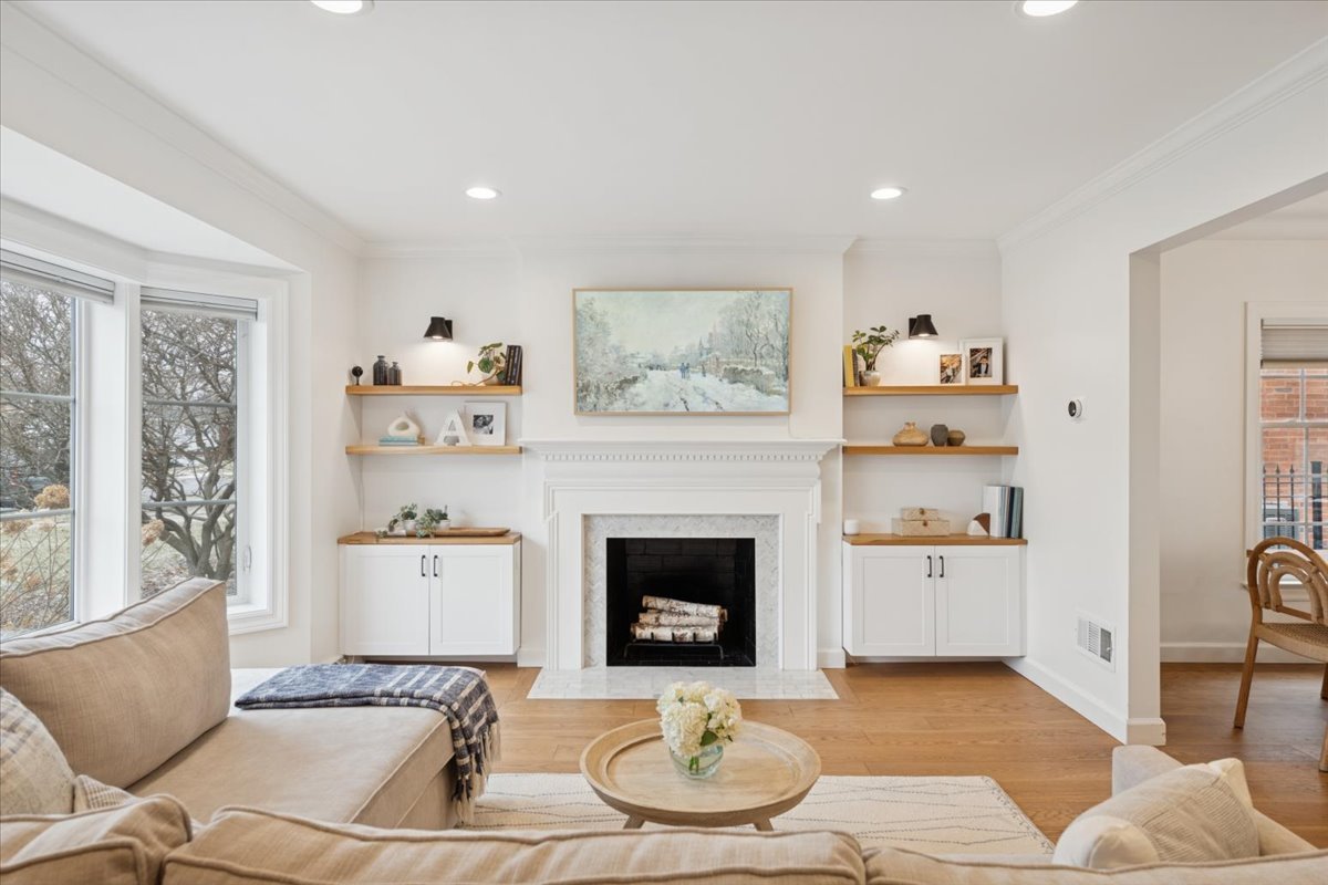 736 Ottawa Avenue Park Ridge, IL 60068 - Photo 2 of 33 a living room with furniture and a fireplace