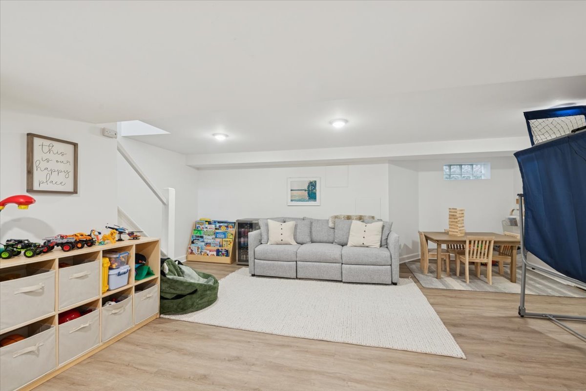 736 Ottawa Avenue Park Ridge, IL 60068 - Photo 22 of 33 a living room with furniture and a flat screen tv