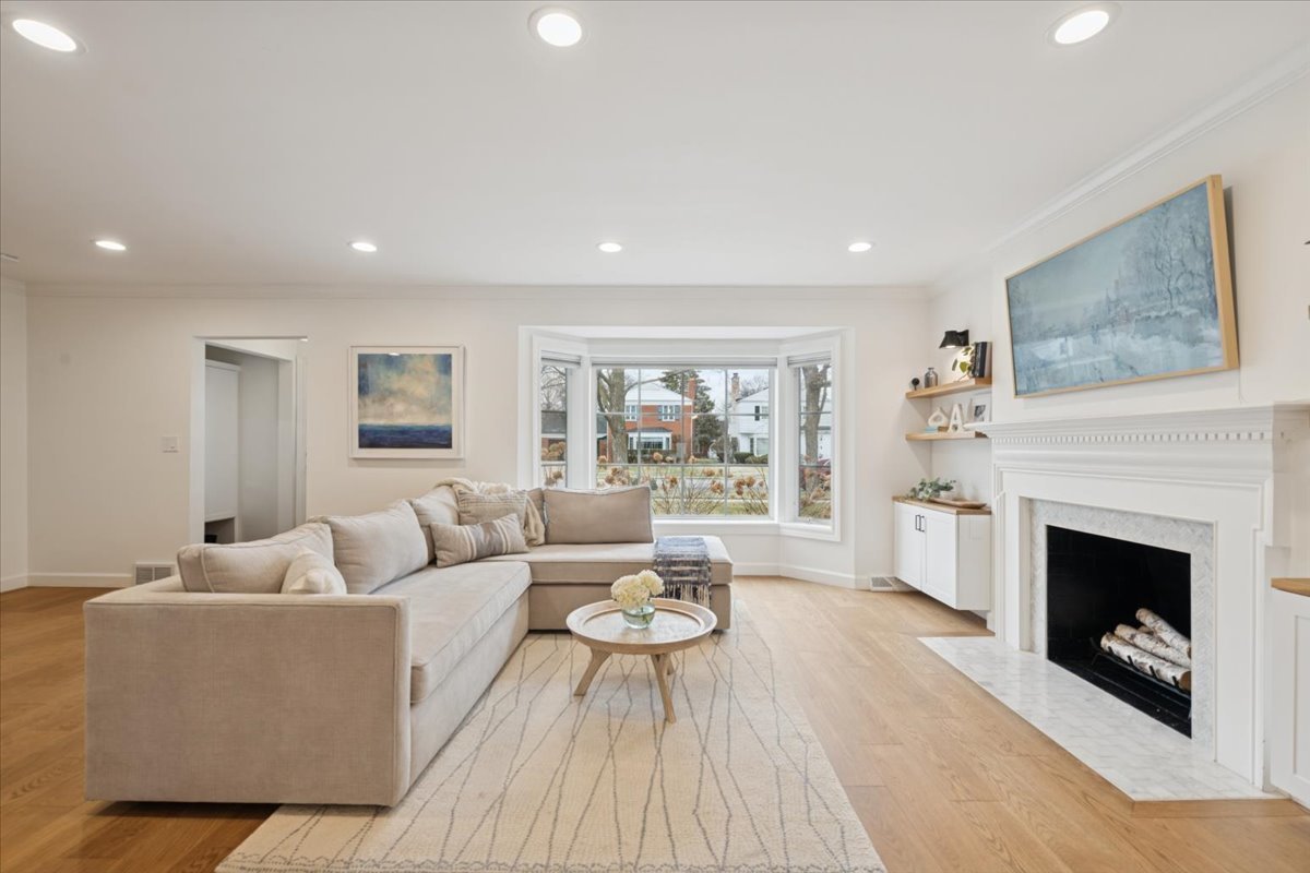 736 Ottawa Avenue Park Ridge, IL 60068 - Photo 5 of 33 a living room with furniture and a fireplace